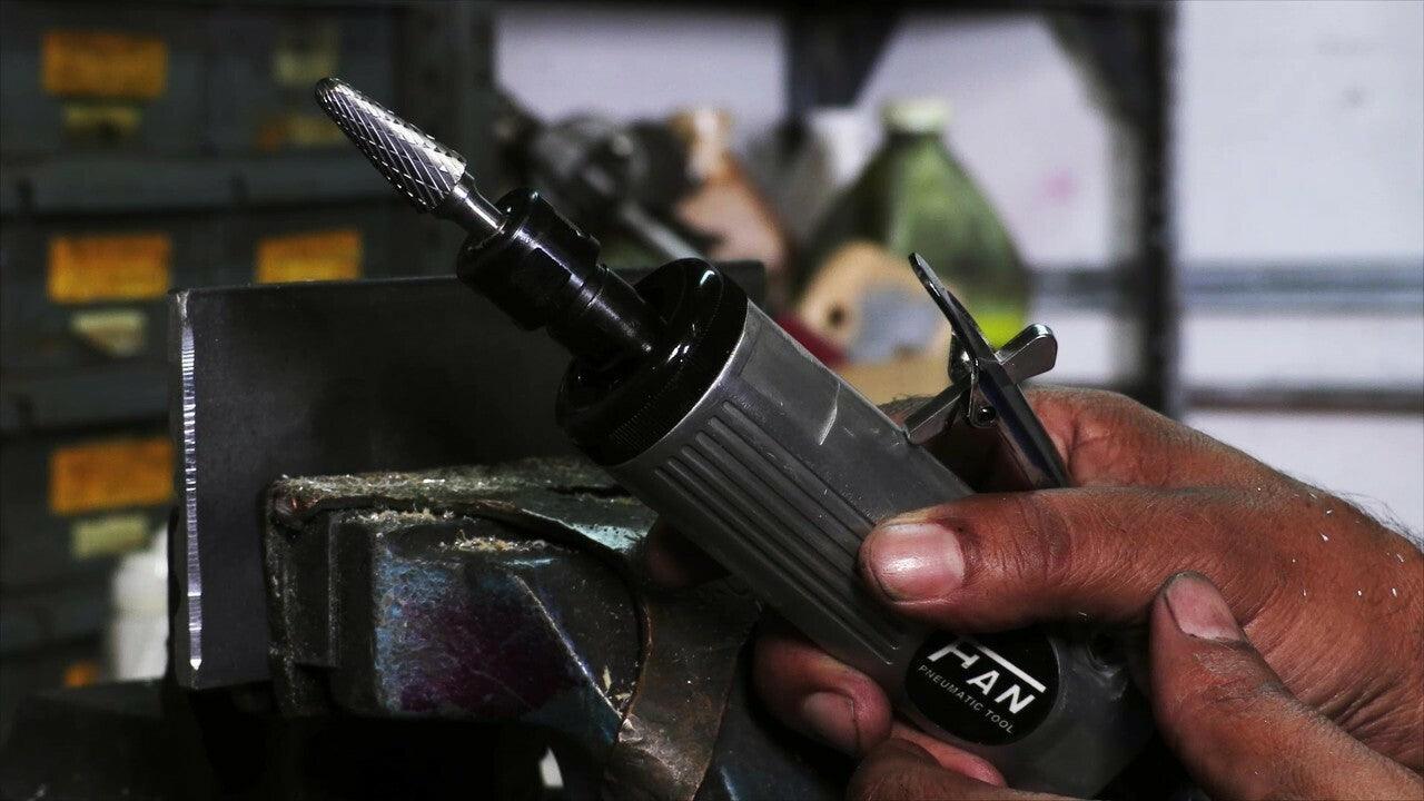 Photo of a deburring tool in a die grinder