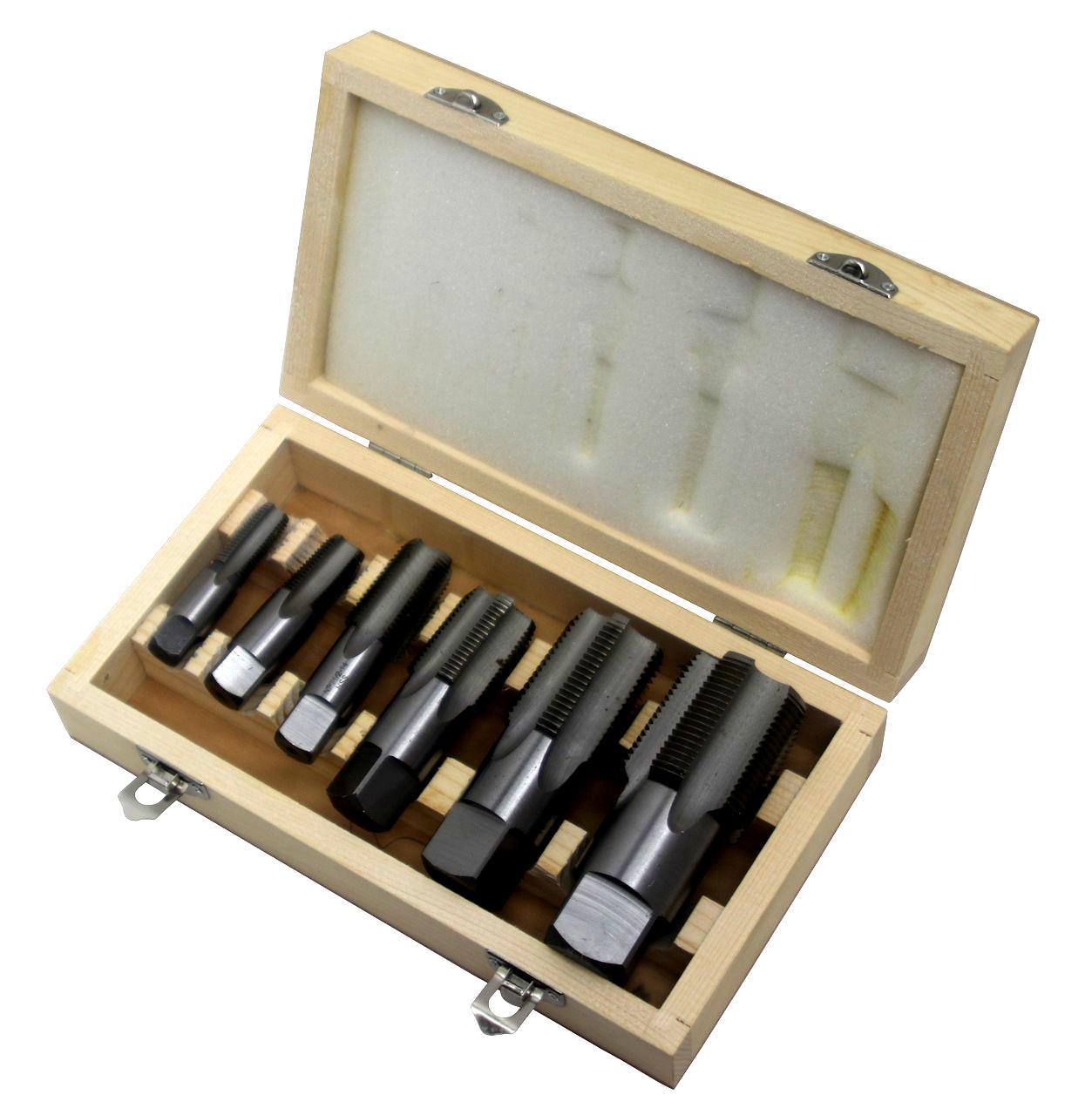 A set of 6 pipe taps in a wooden case