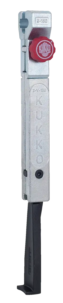 Metal gear puller tool with red rotating knob, industrial tool on white background