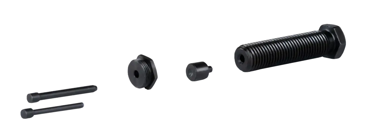 Black steel shop tool parts kit with threaded bolts and hex components on white background