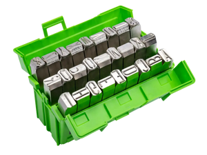 Metal letter and number stamps set in a green plastic case for industrial marking