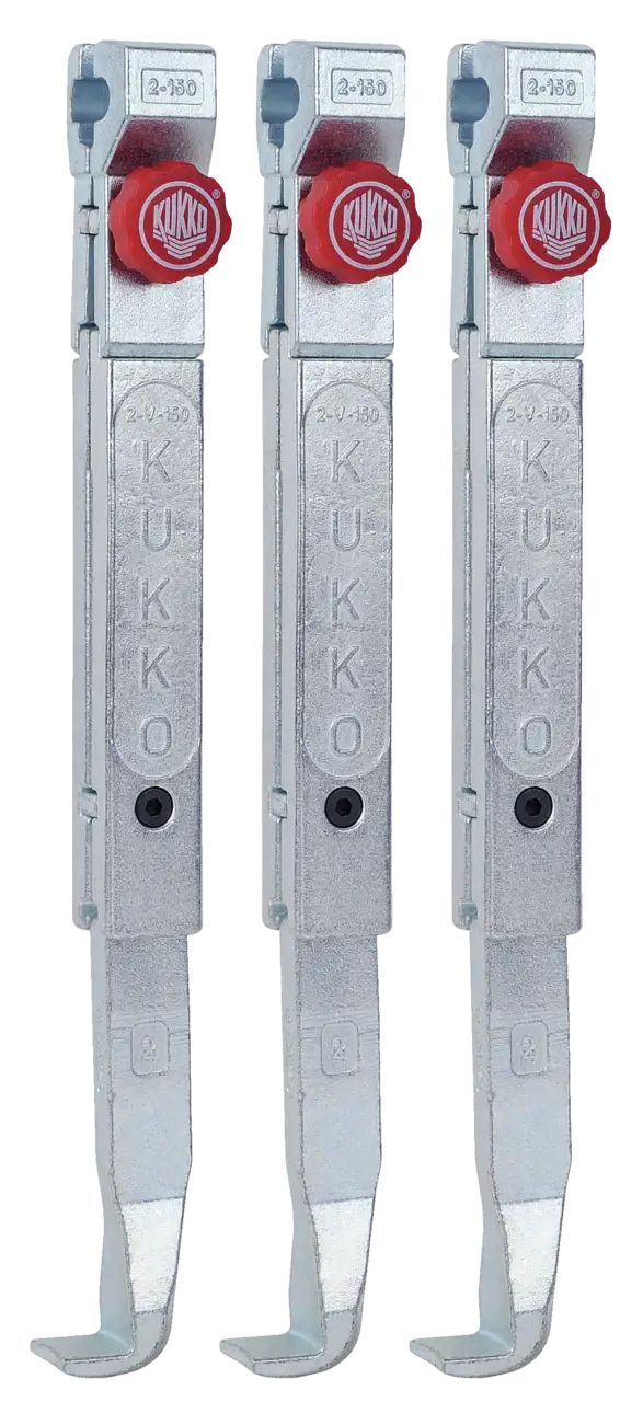Three metal puller arms with red adjustment knobs, labeled KUKKO, for industrial tool use