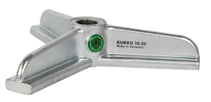 Silver three-arm Kukko puller yoke with threaded center, industrial tool closeup
