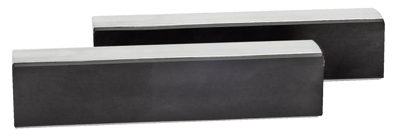 Pair of magnetic vise jaw covers for shop tools on white background