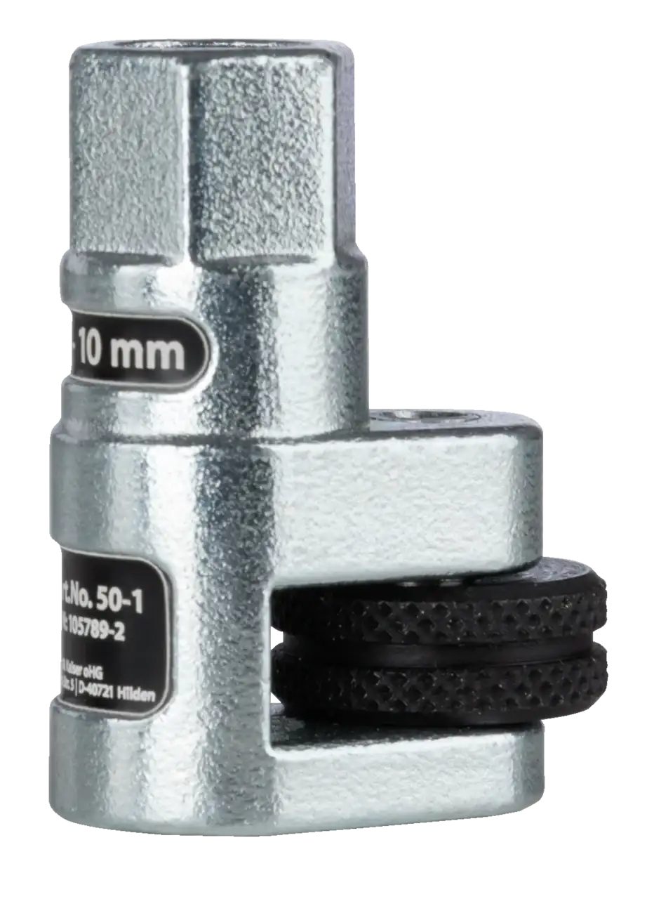 Close-up of metallic pipe cutter tool with 10 mm marking, black cutting wheels visible