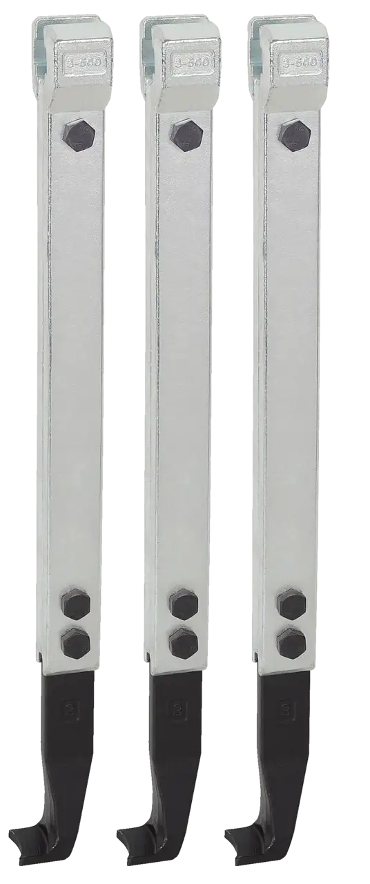 Three industrial metal lathe cutting tool holders with bolts, for precision shop machining