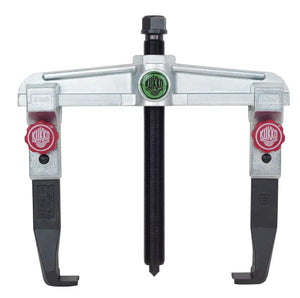 Adjustable two-arm gear puller with threaded center screw and Kukko branding, industrial tool.