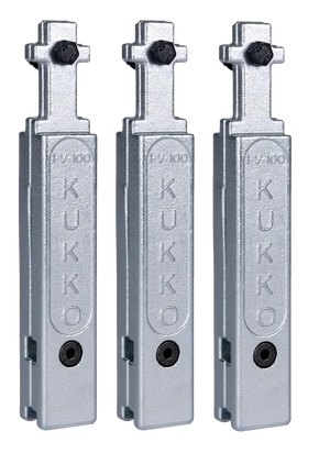 Set of three Kukko industrial metal tool jaws for pullers, isolated on black background