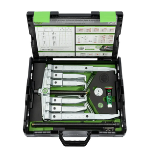 Universal puller tool set with metal arms, storage case, and instructions inside lid