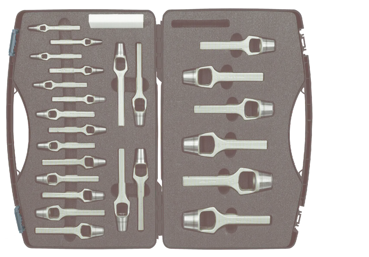 Precision metal punch and chisel set in foam organizer for industrial tool storage