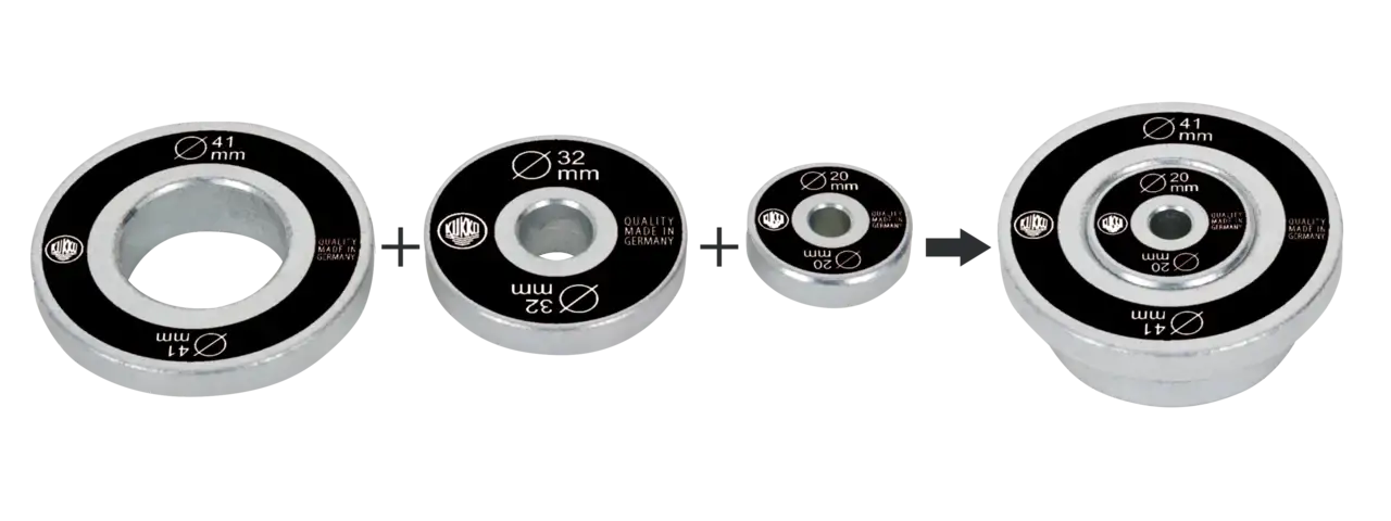 Set of four metal bearing bushings with 20mm, 32mm, and 41mm diameter markings