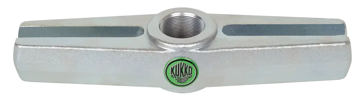 Metal tool component with center threaded hole and Kukko logo, industrial equipment part