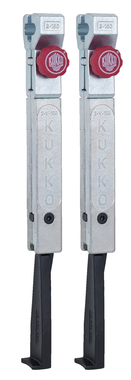 Pair of Kukko metal puller arms with red adjustment knobs, industrial tool parts
