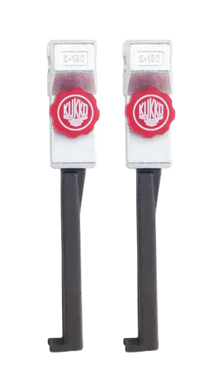 Pair of Kukko industrial tool arms with red adjustment knobs on white background