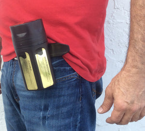 A man with a plastic drill case attached to his belt