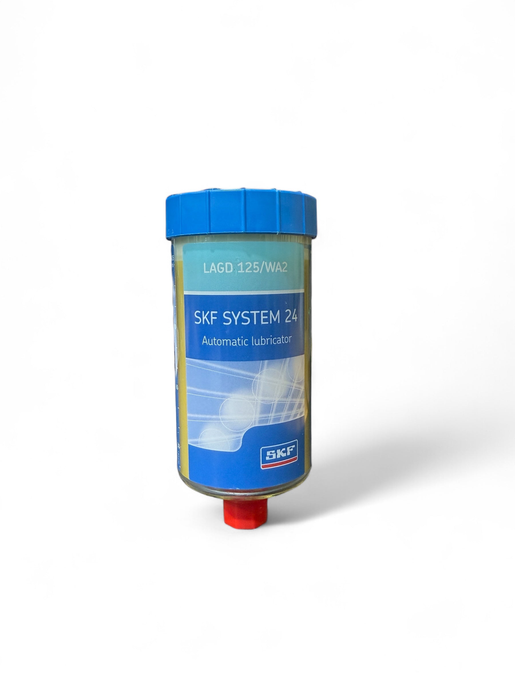 SKF System 24 automatic lubricator on a white background