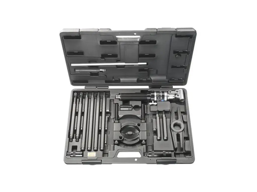 Industrial bearing puller tool set in a black hard case, organized with various components